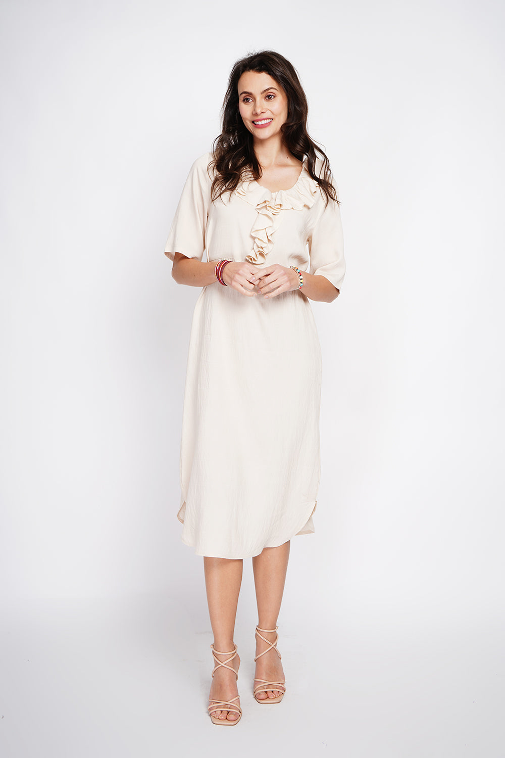 Long V-neck dress with ruffle in front and 3/4 sleeves