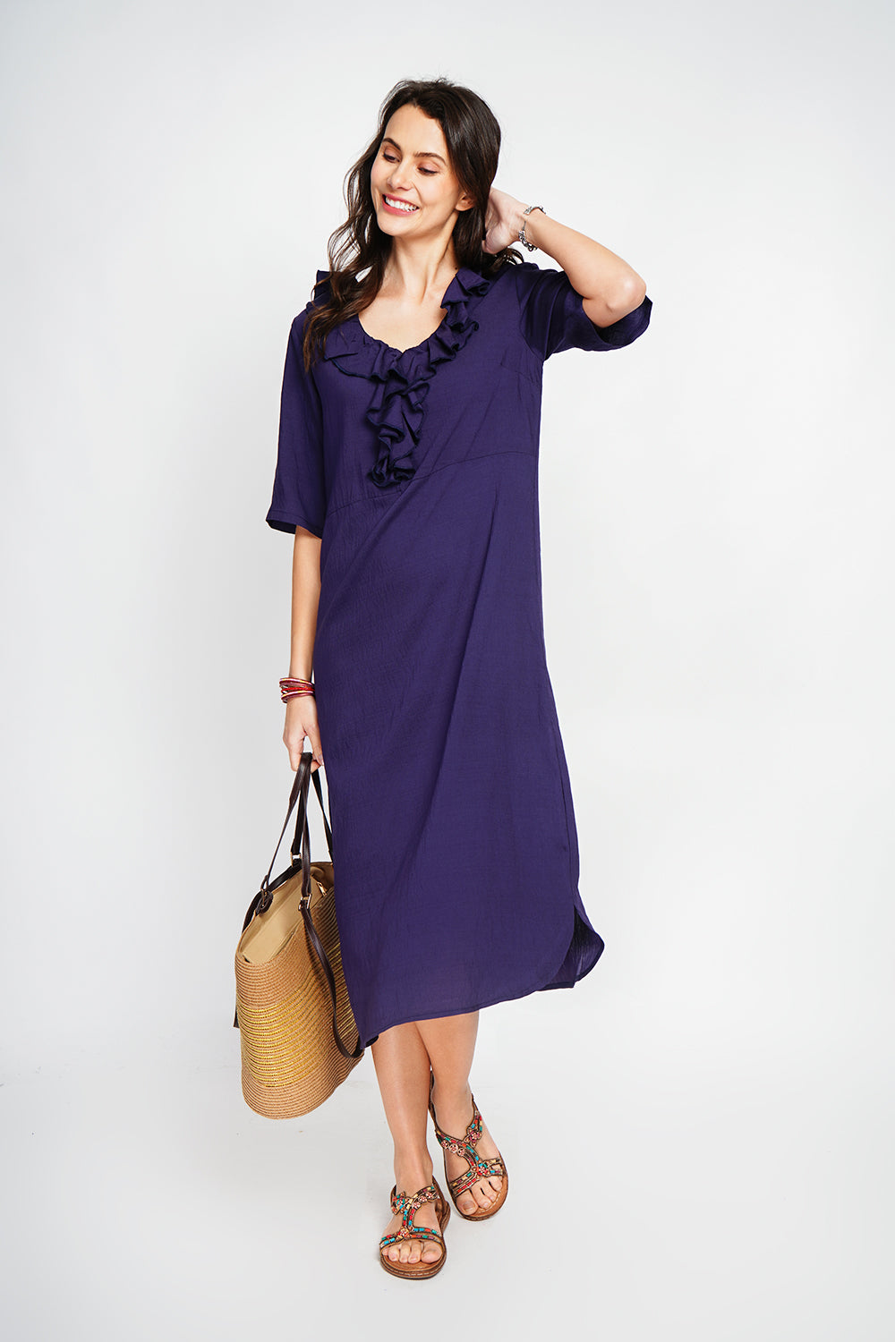 Long V-neck dress with ruffle in front and 3/4 sleeves