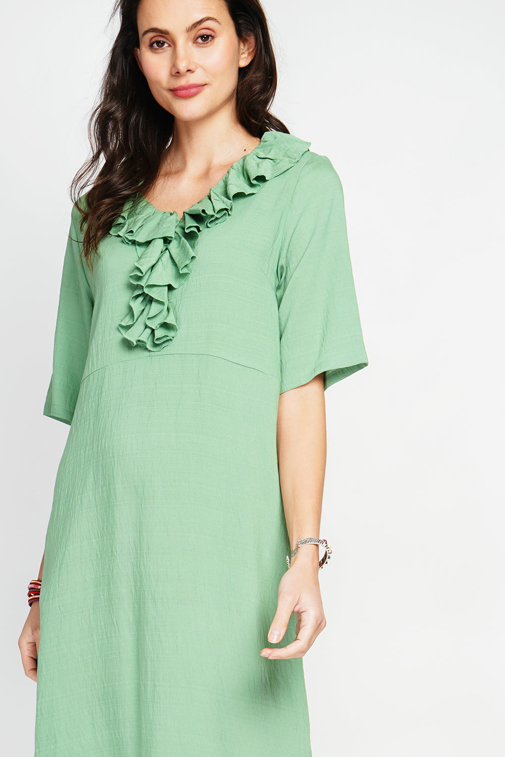 Long V-neck dress with ruffle in front and 3/4 sleeves