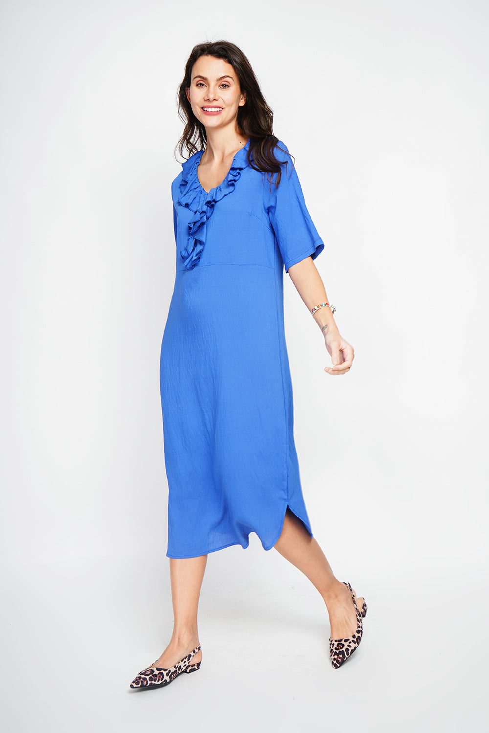 Long V-neck dress with ruffle in front and 3/4 sleeves