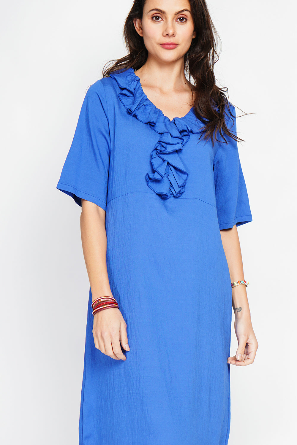 Long V-neck dress with ruffle in front and 3/4 sleeves