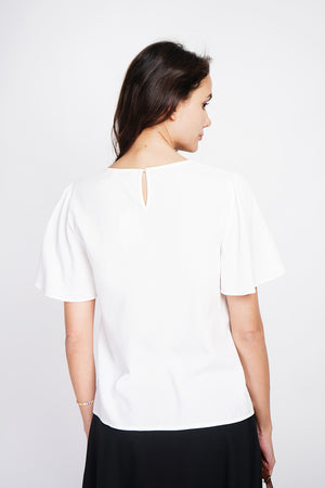 Round neck top with back slit and button closure and short sleeves