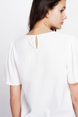 Round neck top with back slit and button closure and short sleeves