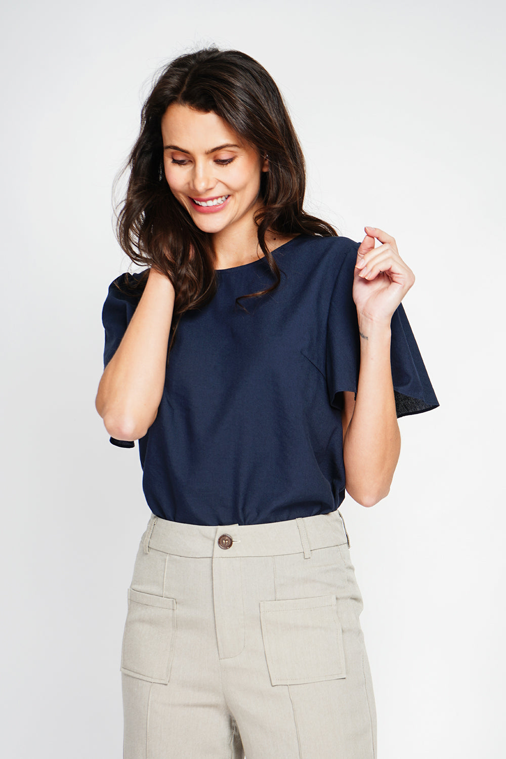 Round neck top with back slit and button closure and short sleeves