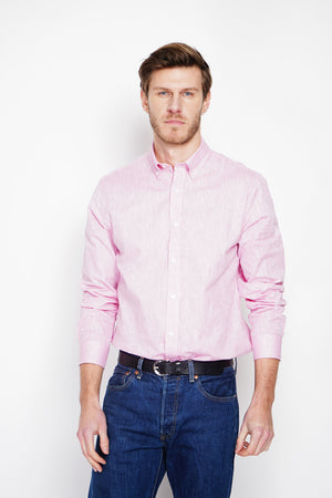 Straight cut shirt with classic collar and rounded cuff with two buttons