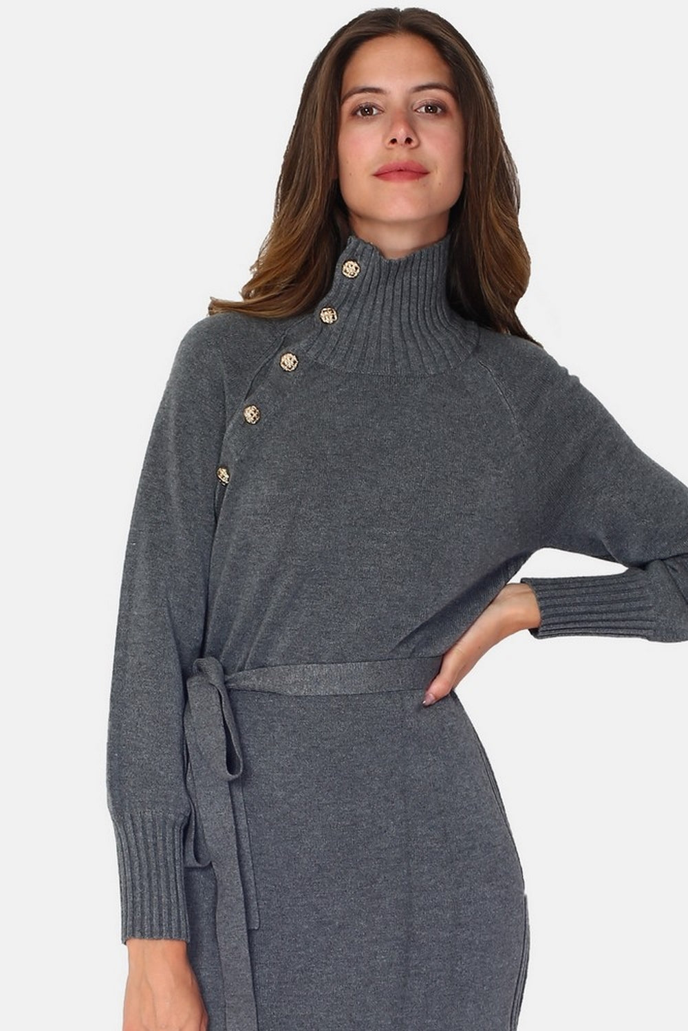 Long high neck dress closed by a button placket in front, rib knit on the sides with long slightly puff sleeved belt