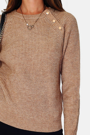 High neck sweater closed by a shoulder button placket, pearl rib knitting