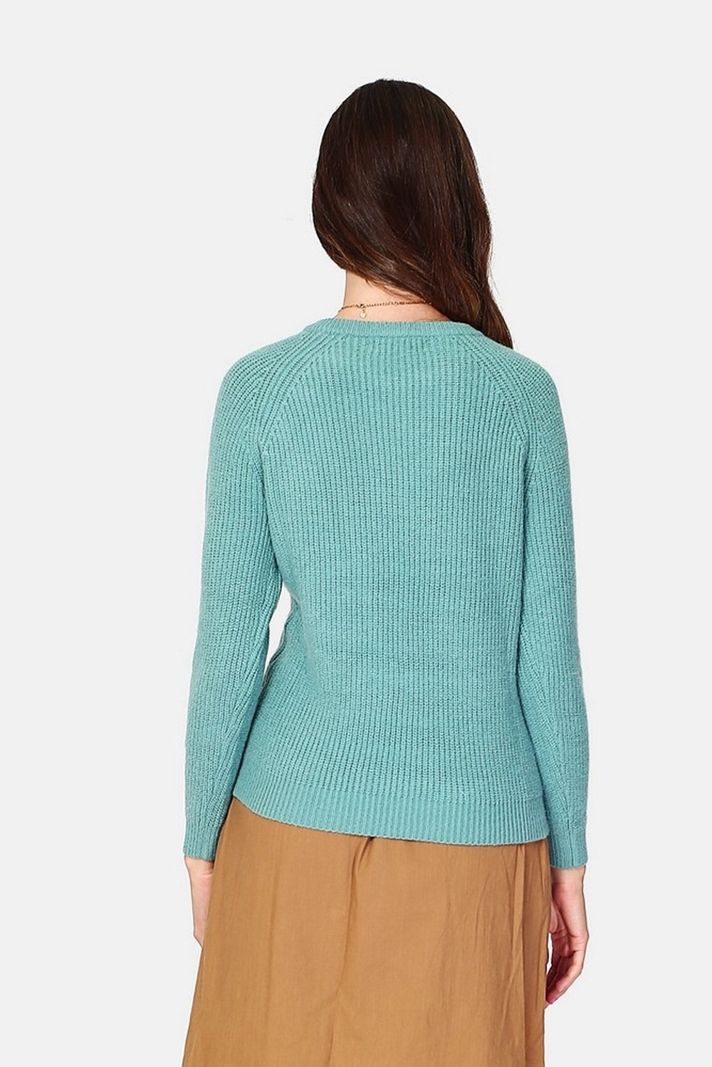 High neck sweater closed by a shoulder button placket, pearl rib knitting