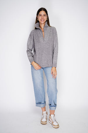 High-neck poncho sweater closed with a zip, fancy knitting with long sleeves