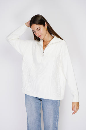 High-neck poncho sweater closed with a zip, fancy knitting with long sleeves