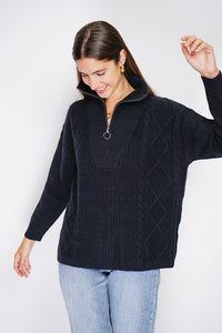 High-neck poncho sweater closed with a zip, fancy knitting with long sleeves