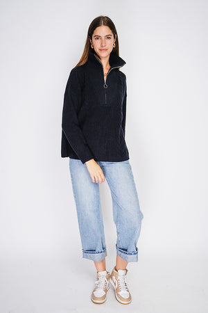 High-neck poncho sweater closed with a zip, fancy knitting with long sleeves