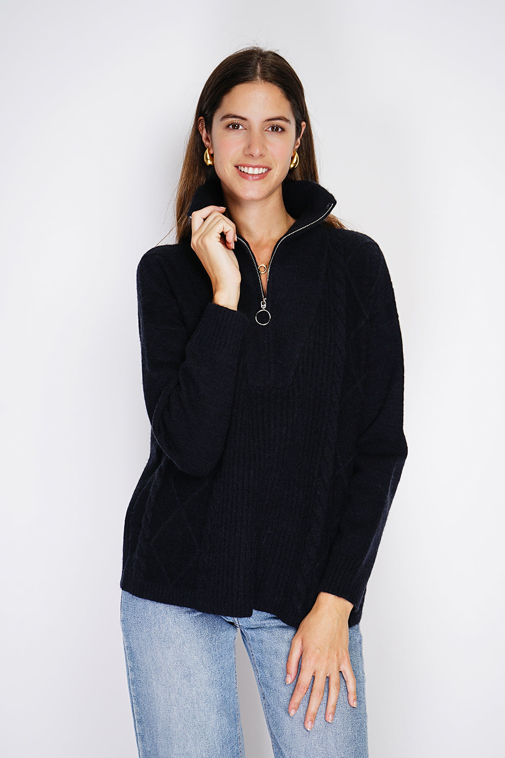 High-neck poncho sweater closed with a zip, fancy knitting with long sleeves