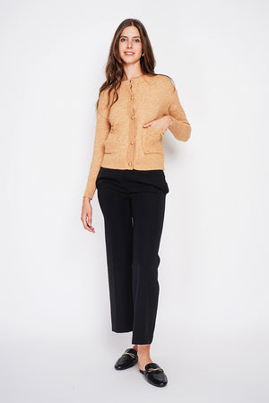 Crew neck vest with fancy buttoned front pockets and long sleeves