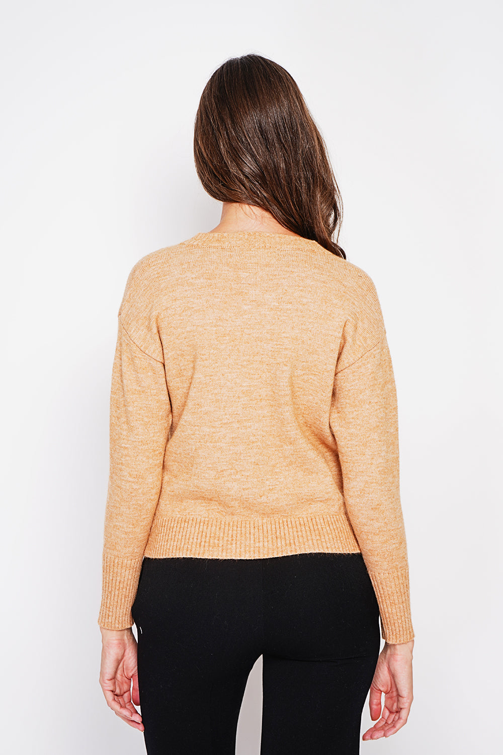 Crew neck vest with fancy buttoned front pockets and long sleeves
