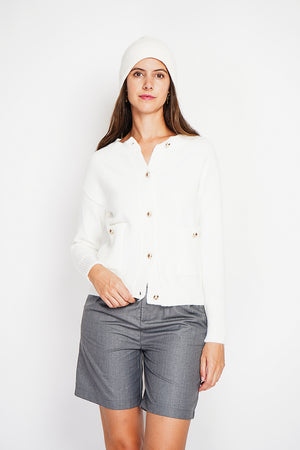 Crew neck vest with fancy buttoned front pockets and long sleeves
