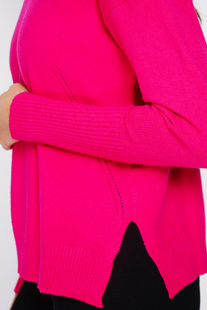 Oversized turtleneck sweater with openwork front and long sleeves