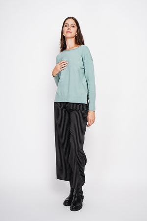 Oversized turtleneck sweater with openwork front and long sleeves