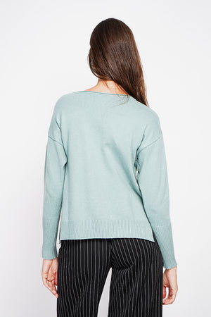 Oversized turtleneck sweater with openwork front and long sleeves