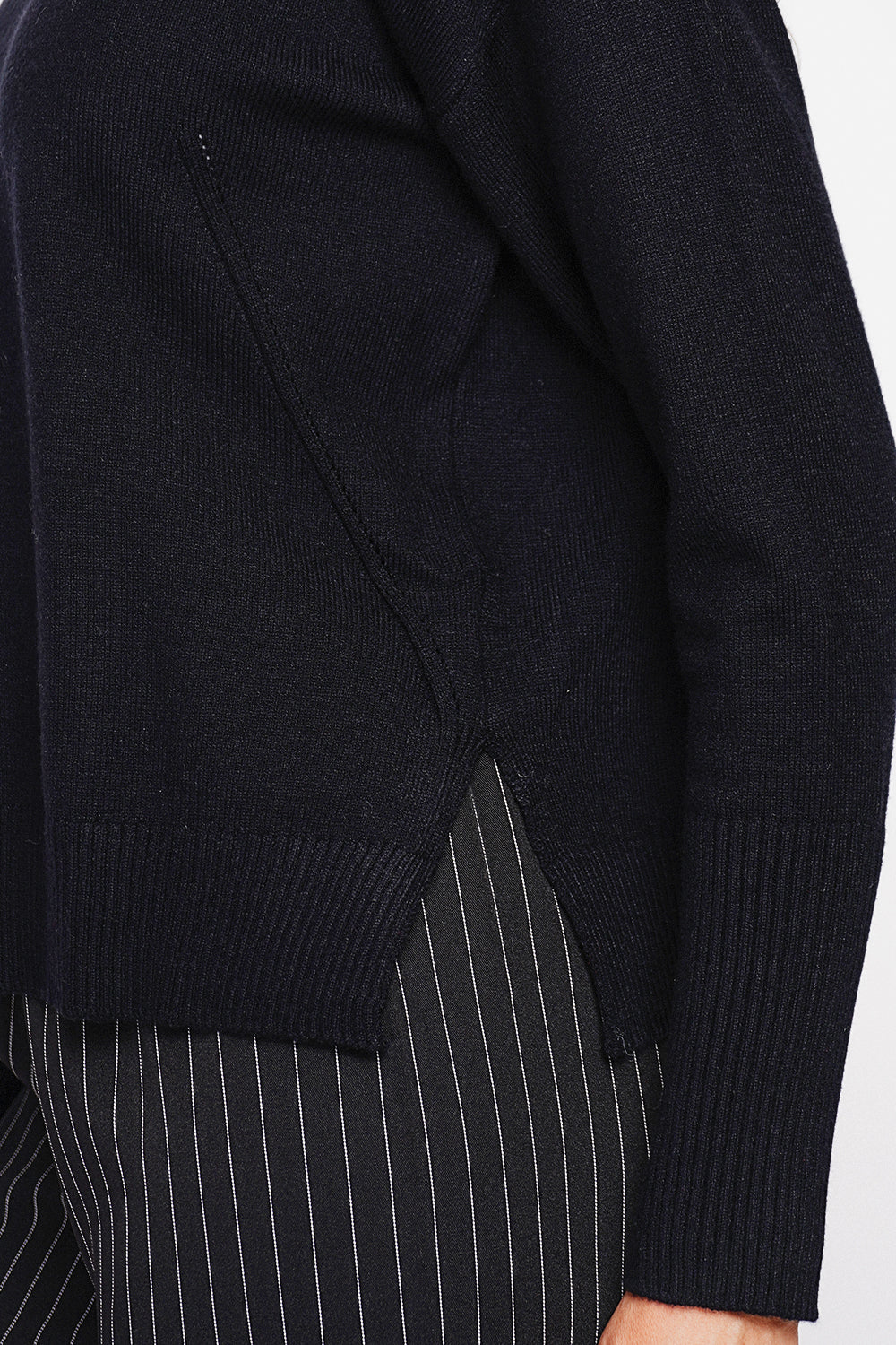 Oversized turtleneck sweater with openwork front and long sleeves