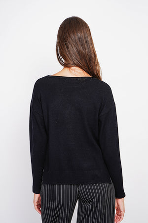 Oversized turtleneck sweater with openwork front and long sleeves