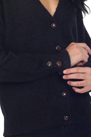V-NECK CARDIGAN WITH BUTTONING TABS AND RUFFLED CUFFS