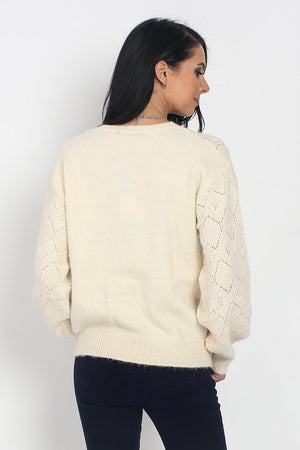 ROUND NECK SWEATER WITH SLIGHTLY PUFFY SLEEVES AND RIBBING