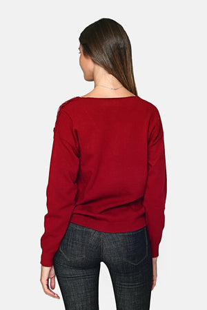 V-neck sweater closed by a shoulder button placket with long sleeves