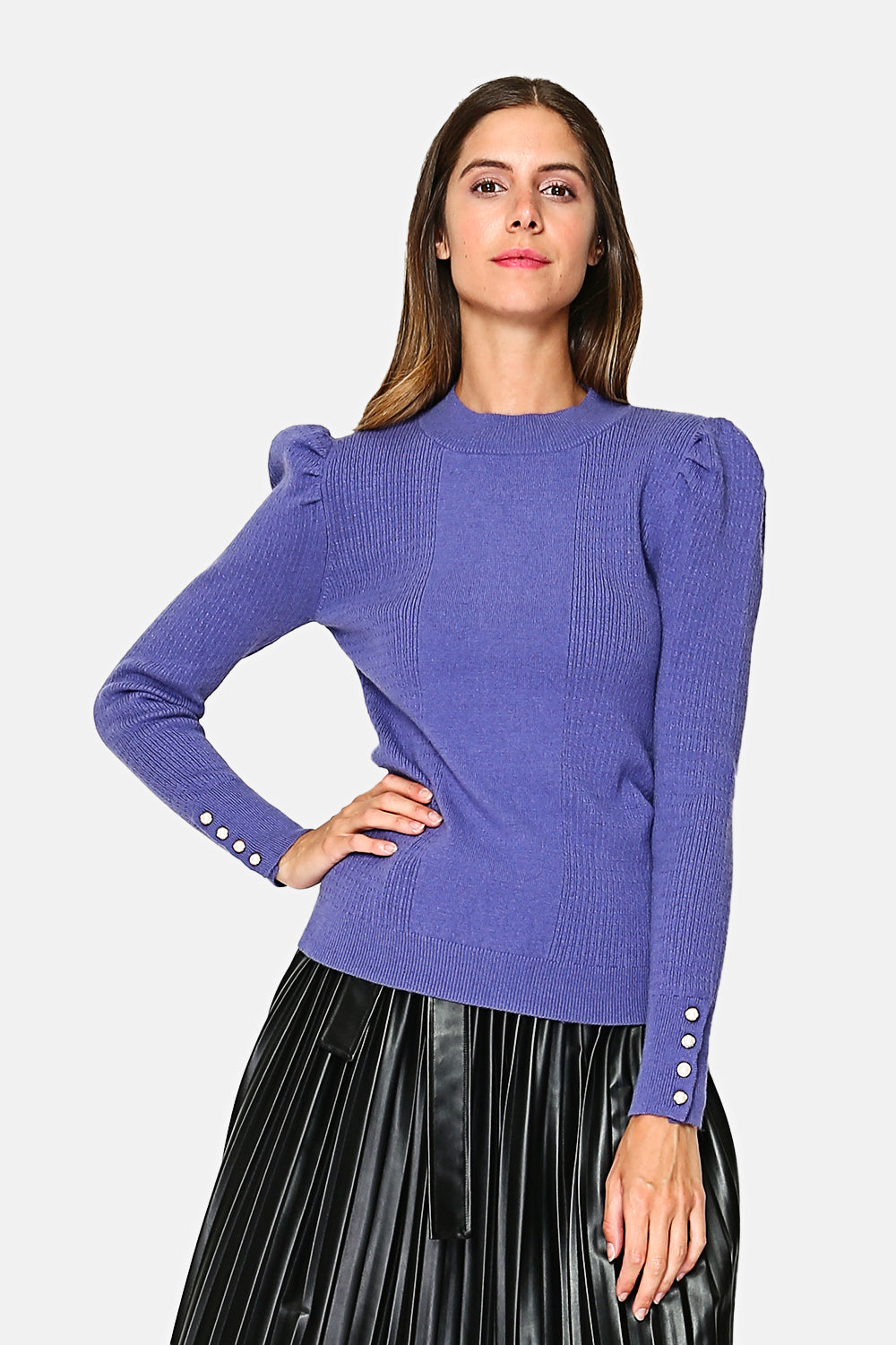 Slightly high neck sweater, fancy knit, buttoning at the bottom of the sleeve