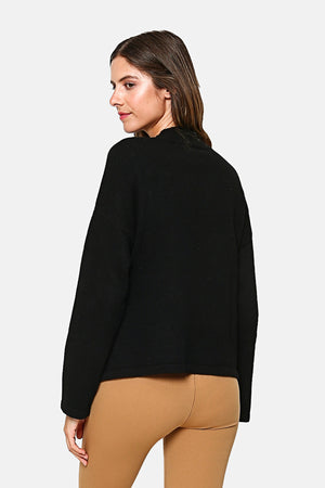 High neck sweater with buttons on the sleeves